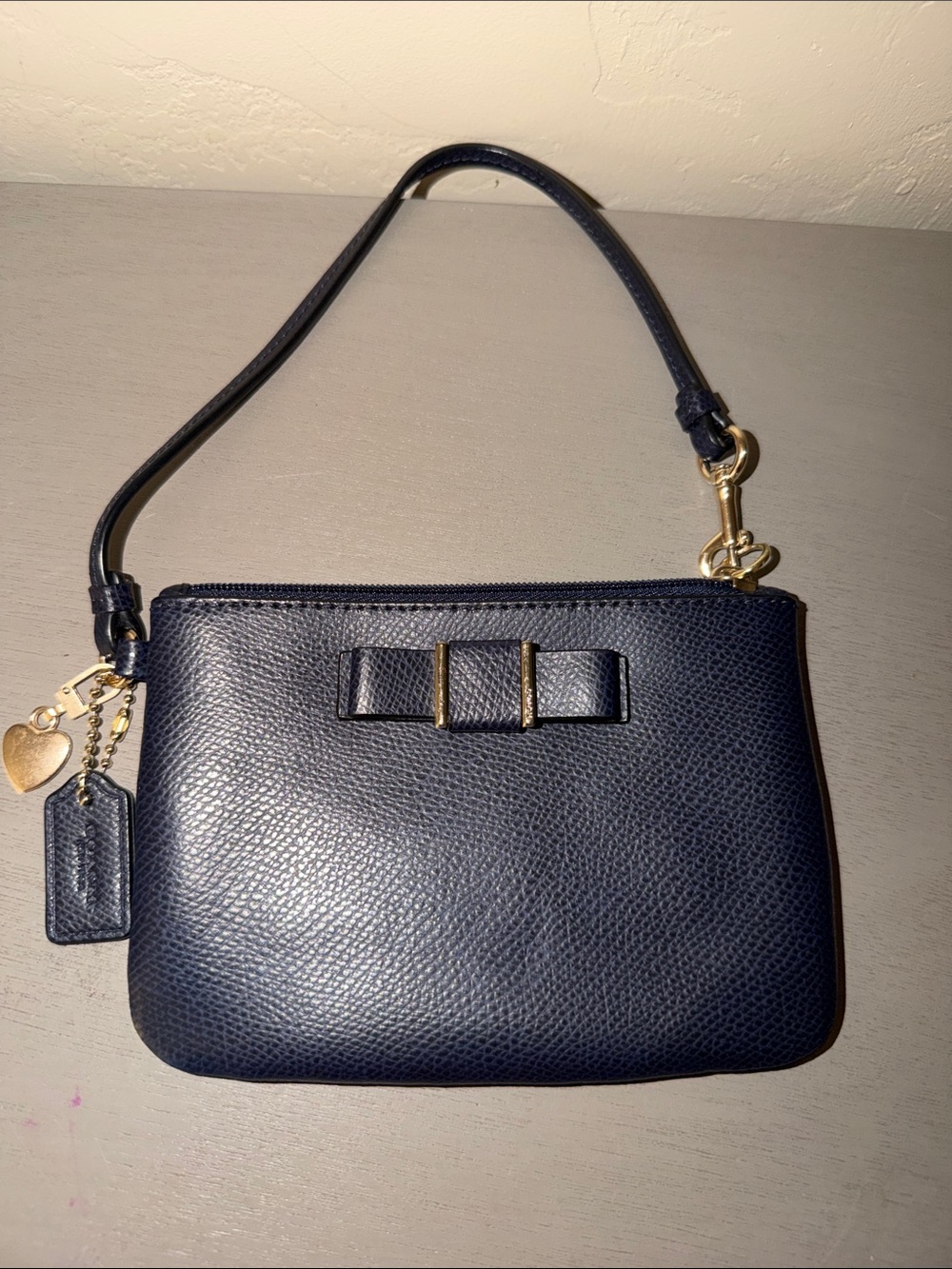 Coach Navy Leather Wristlet with Bow and Gold Hardware